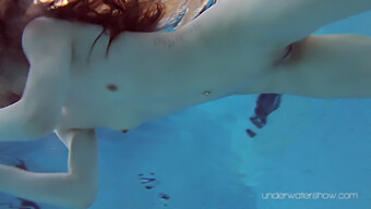 Sultry Redhead Roxalana Cheh In The Pool, Bikini-Clad And Passionate